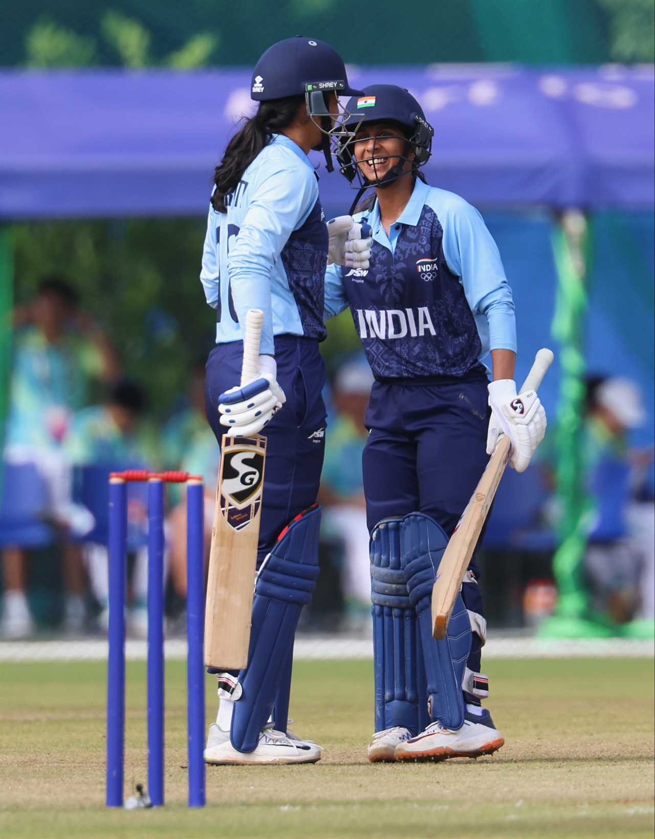 HANGZHOU, CHINA – SEPTEMBER 25: Smriti Shriniwas Mandhana and Jemimah Jessica Rodrigues of India rests during the 2022 Asian Games women’s Cricket gold medal match between India and Sri Lanka on September 25, 2023 in Hangzhou, China. (Photo by Lintao Zhang/Getty Images)