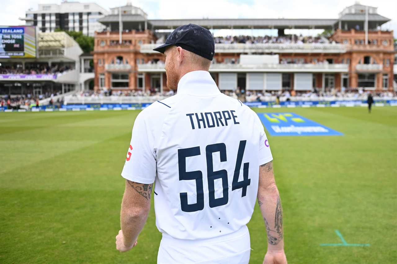 a man wearing a white shirt with the name thorpe and the number 564