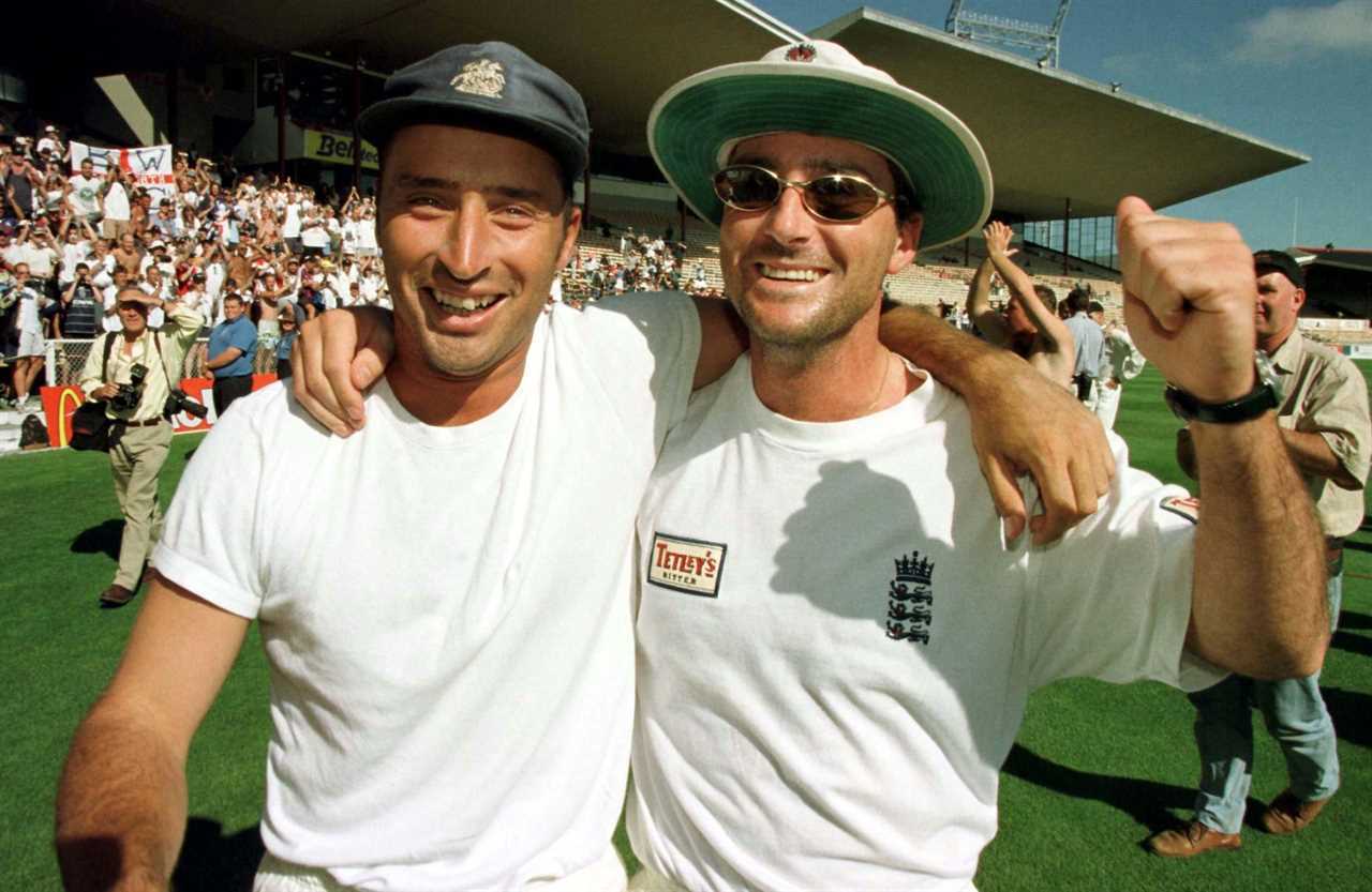 two men posing for a picture with one wearing a shirt that says toney 's