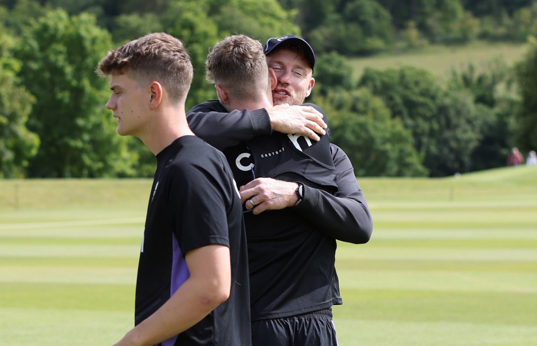 HIGH WYCOMBE, ENGLAND - JULY 08: Rocky Flintoff of England U19 is congratulated by is father Andrew Flintoff after receiving his debut cap before day one of the 1st Youth Test between England U19 and Sri Lanka U19 at Wormsley Cricket Ground on July 08, 2024 in High Wycombe, England. (Photo by Ryan Pierse - ECB/ECB via Getty Images)