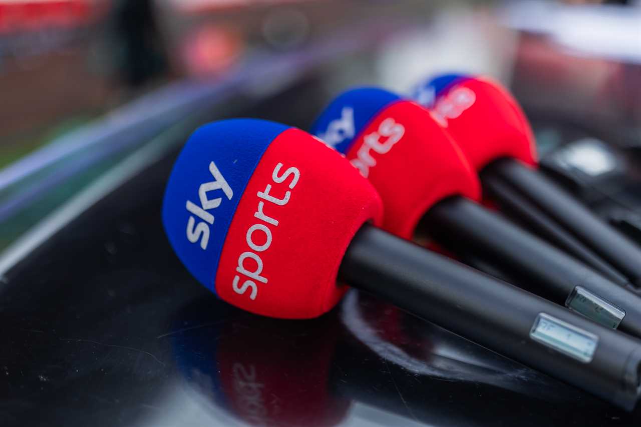 three sky sports microphones are lined up on a table