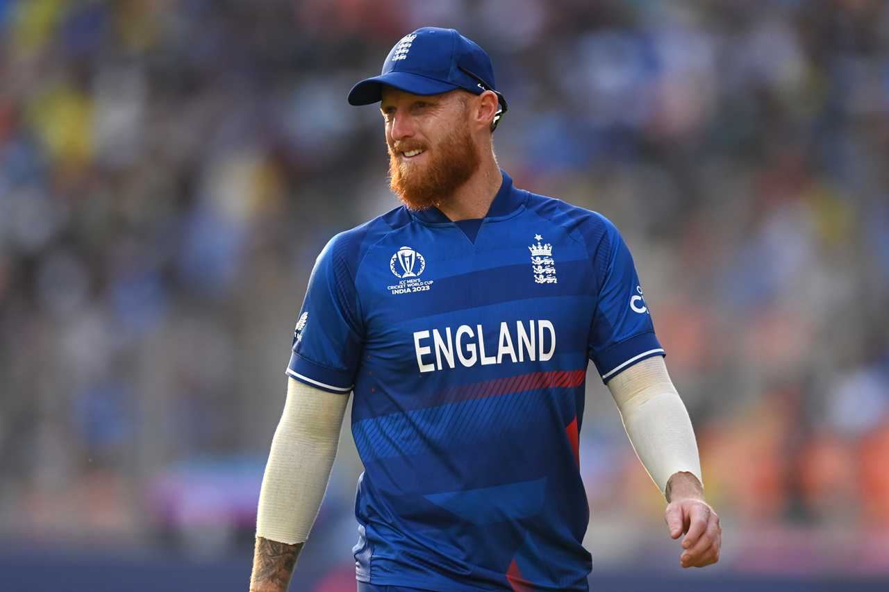 a man wearing a blue shirt that says england on it