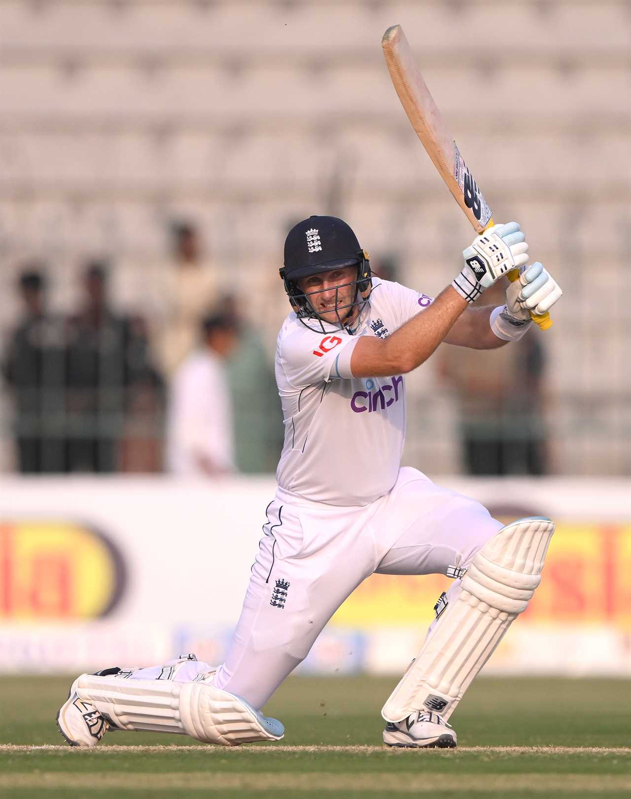 a cricket player with the word cinch on his shirt