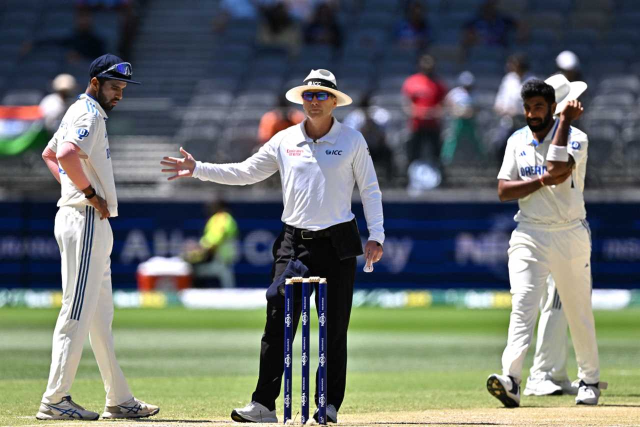 Umpire Chris Gaffoney signals no-ball by India's paceman Jasprit Bumrah (R) on day four of the first Test cricket match between Australia and India at Optus Stadium in Perth on November 25, 2024. (Photo by SAEED KHAN / AFP) / -- IMAGE RESTRICTED TO EDITORIAL USE - STRICTLY NO COMMERCIAL USE -- (Photo by SAEED KHAN/AFP via Getty Images)