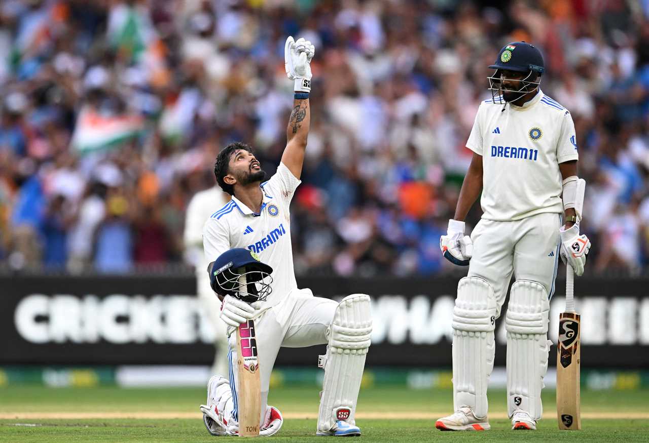 Cricket player Nitish Reddy celebrates his century.