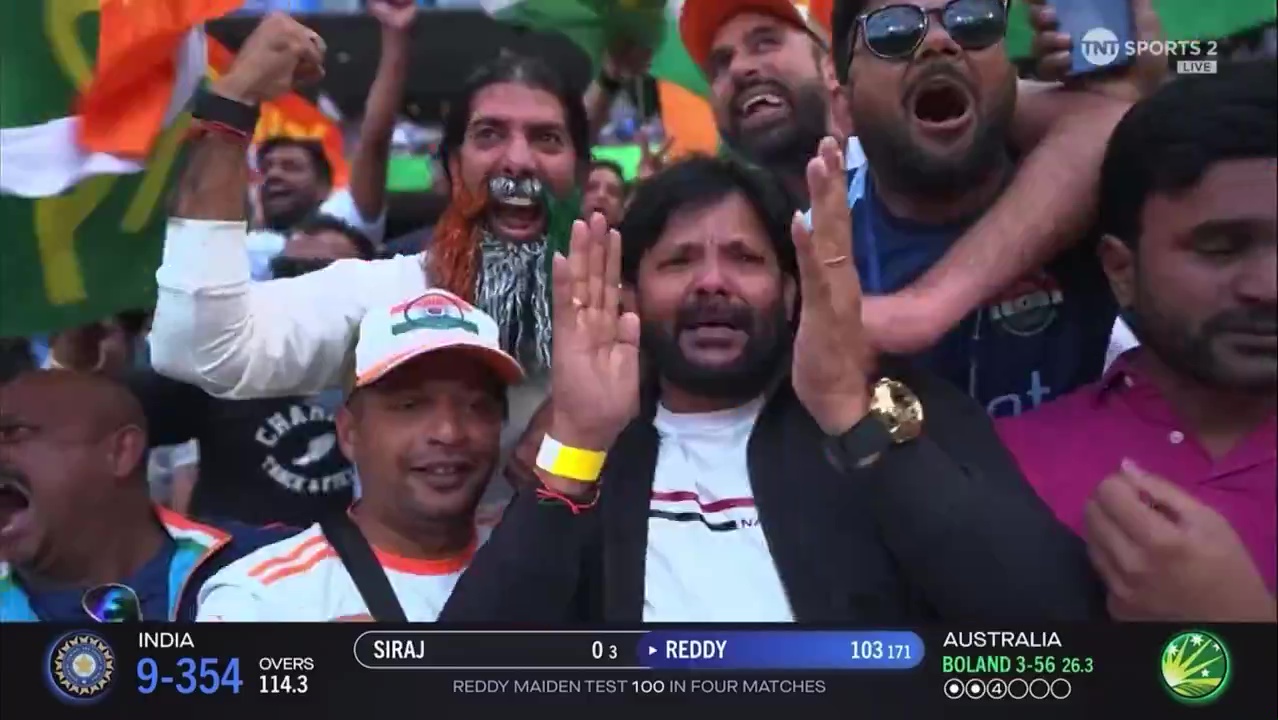 Emotional father celebrating his son's cricket century.