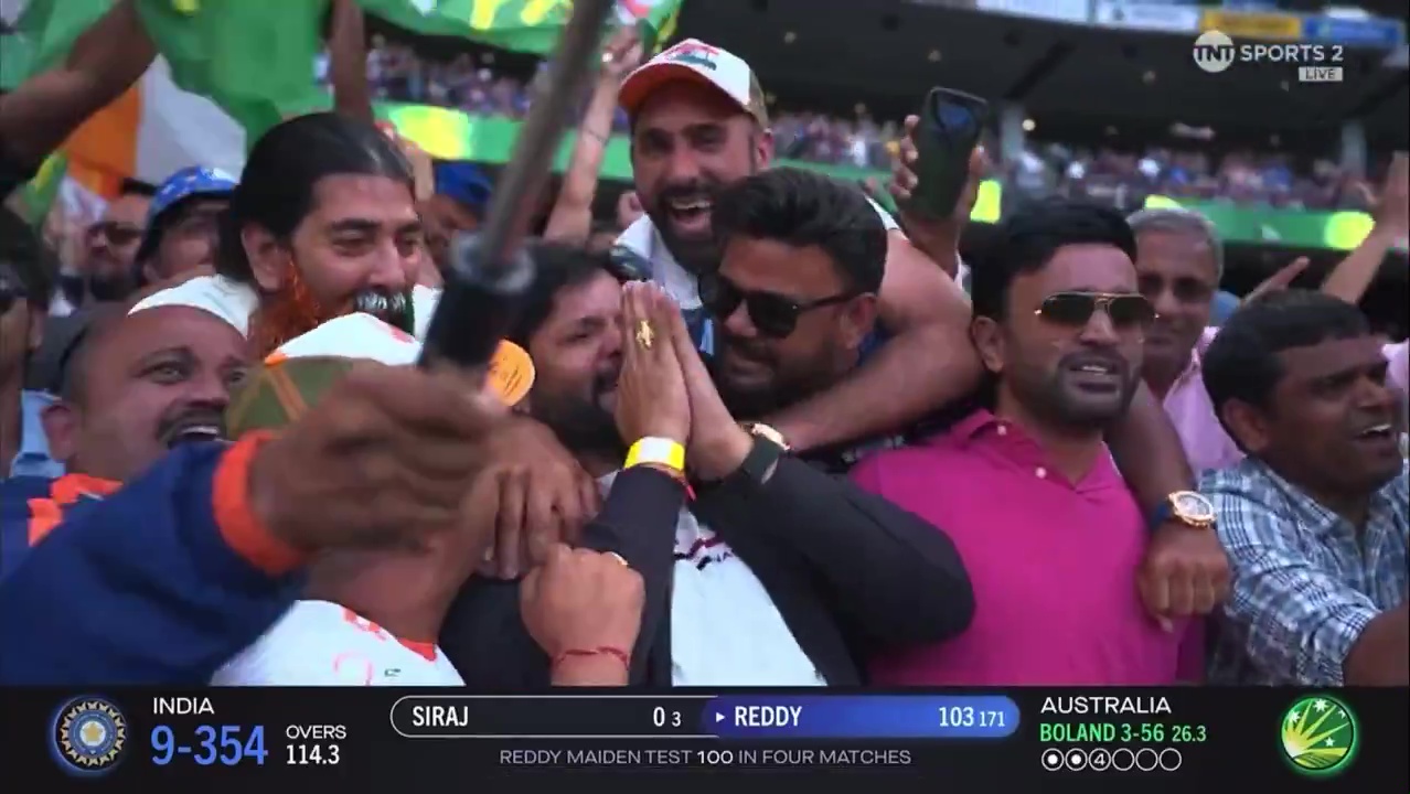 Emotional father celebrating his son's cricket century.