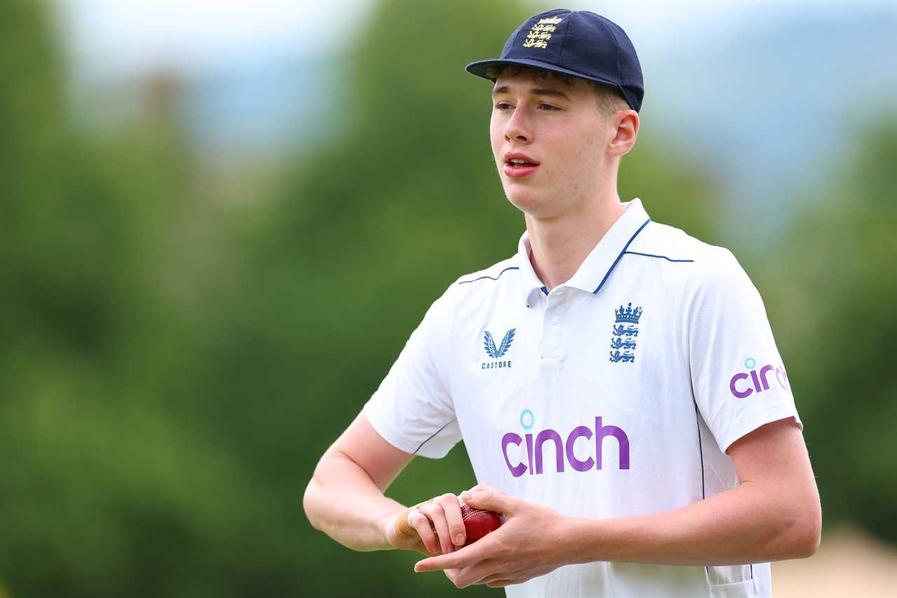 Rocky Flintoff of England U-19 holding a cricket ball.