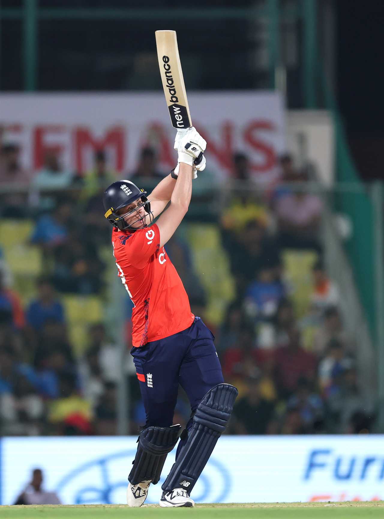 Jamie Smith of England hitting a six during a T20 International cricket match.