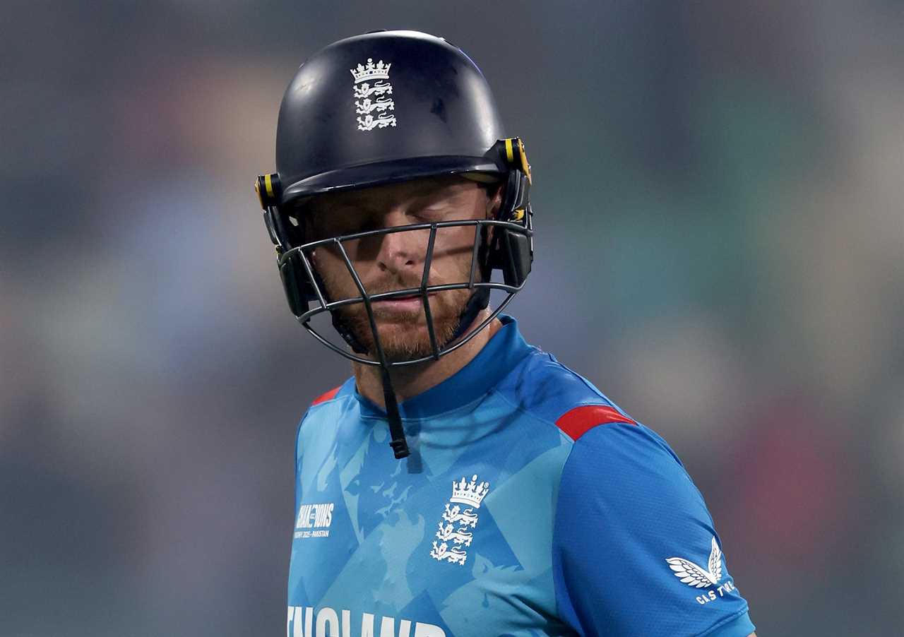 Jos Buttler of England leaves the cricket field after being dismissed.