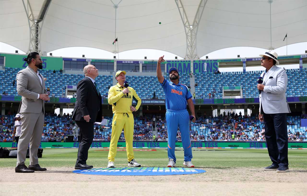 India and Australia cricket captains at the coin toss.