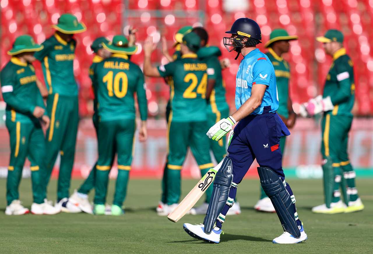 Jos Buttler of England looks dejected after being dismissed during a cricket match.