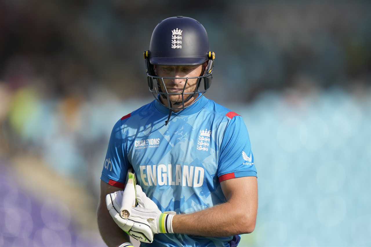 Jos Buttler of England walking off the field after being dismissed during a cricket match.