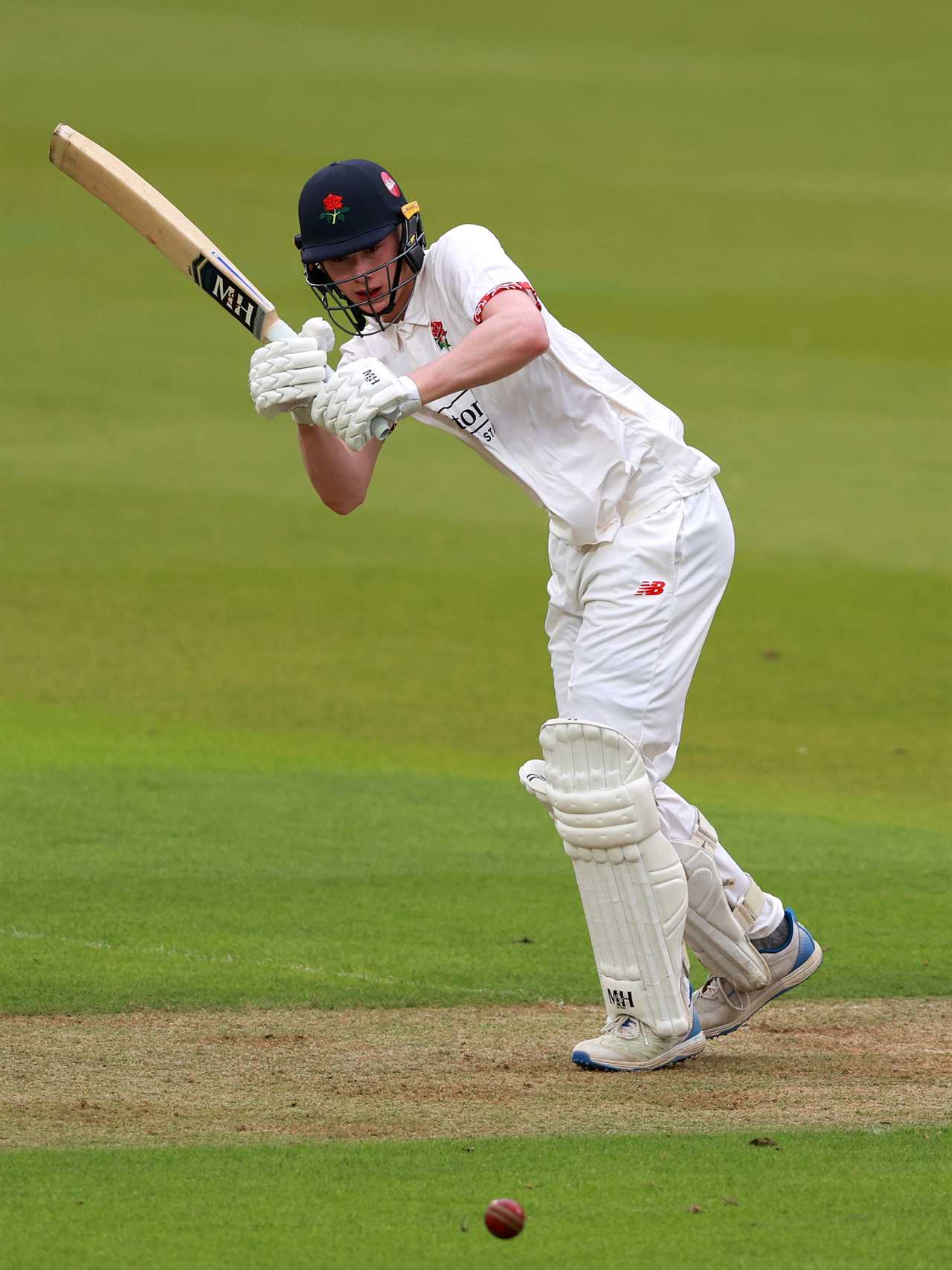 Lancashire cricketer batting.