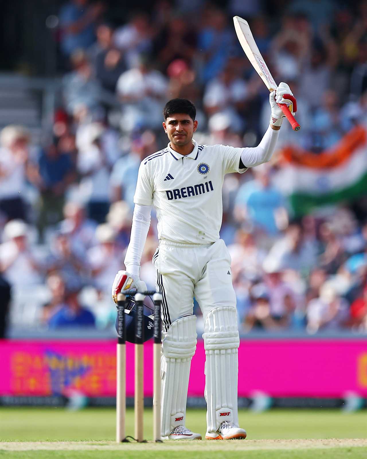 Cricket player Subman Gill celebrating a century.