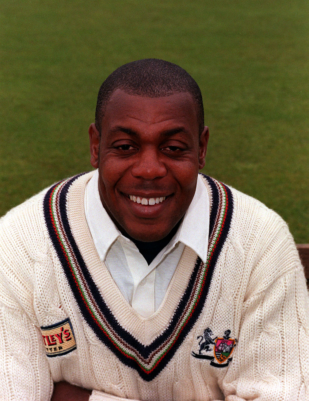 Black and white photo of David Lawrence bowling.
