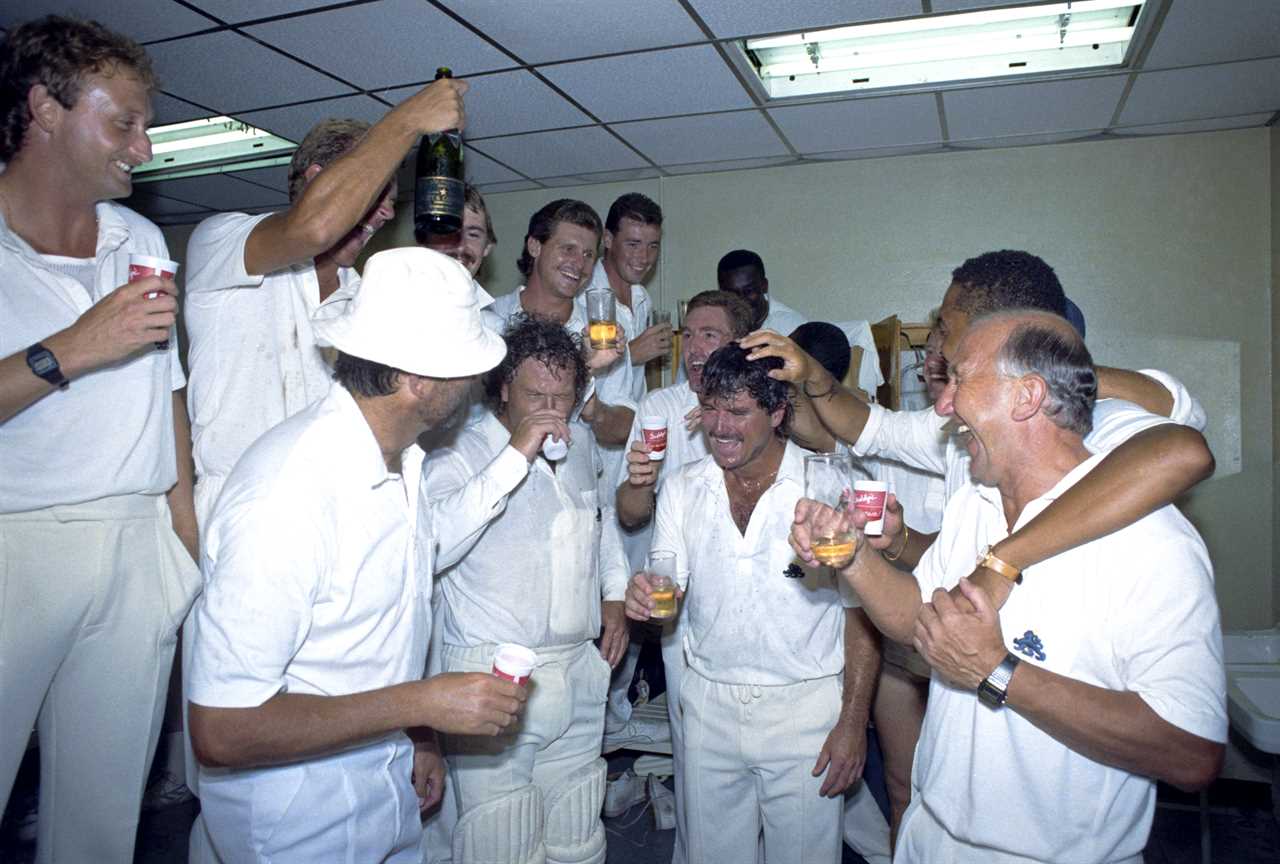England cricket team celebrating a Test match victory.