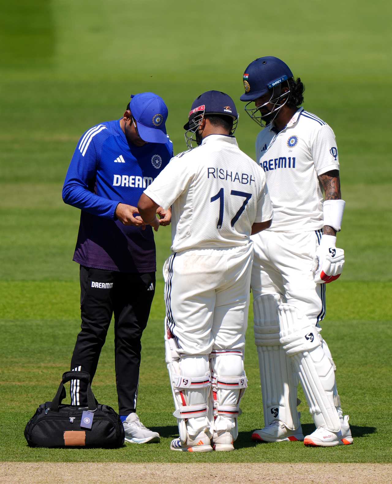 Rishabh Pant, Indian cricketer, receives treatment for a finger injury.
