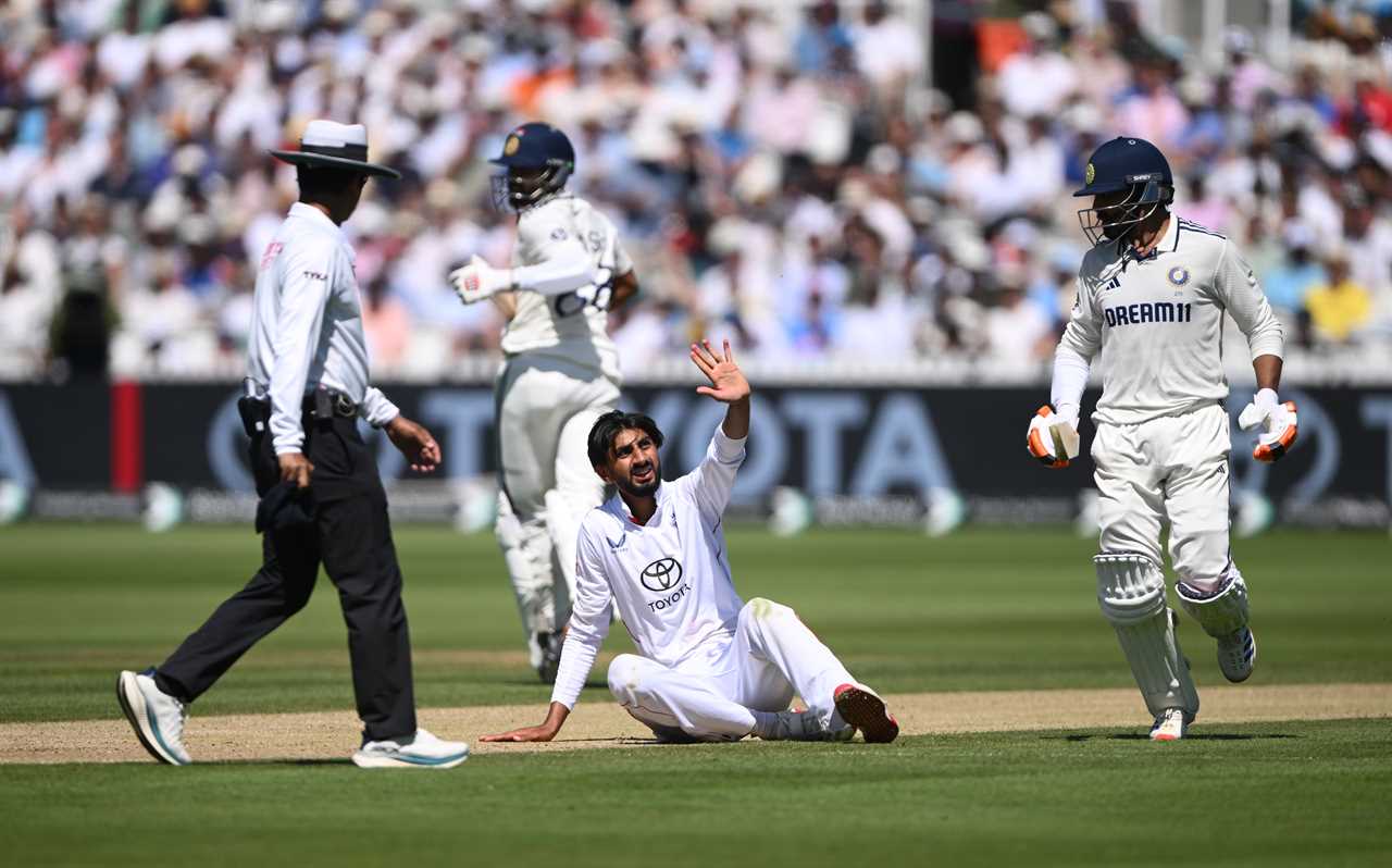 England bowler Shoaib Bashir reacts to a finger injury.
