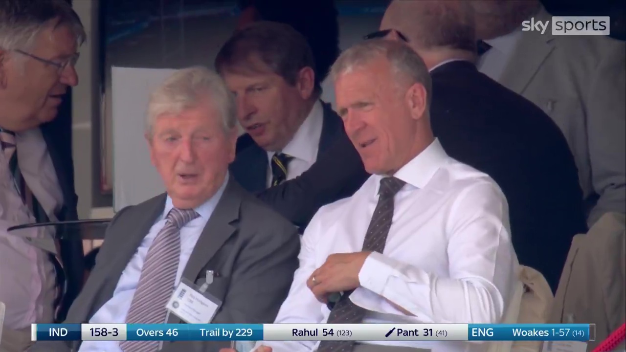 Roy Hodgson and Alec Stewart at a cricket match.
