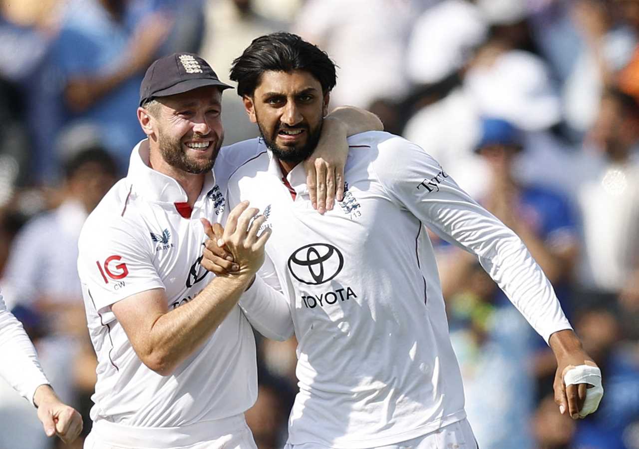 England cricket players Shoaib Bashir and another player celebrating a win.