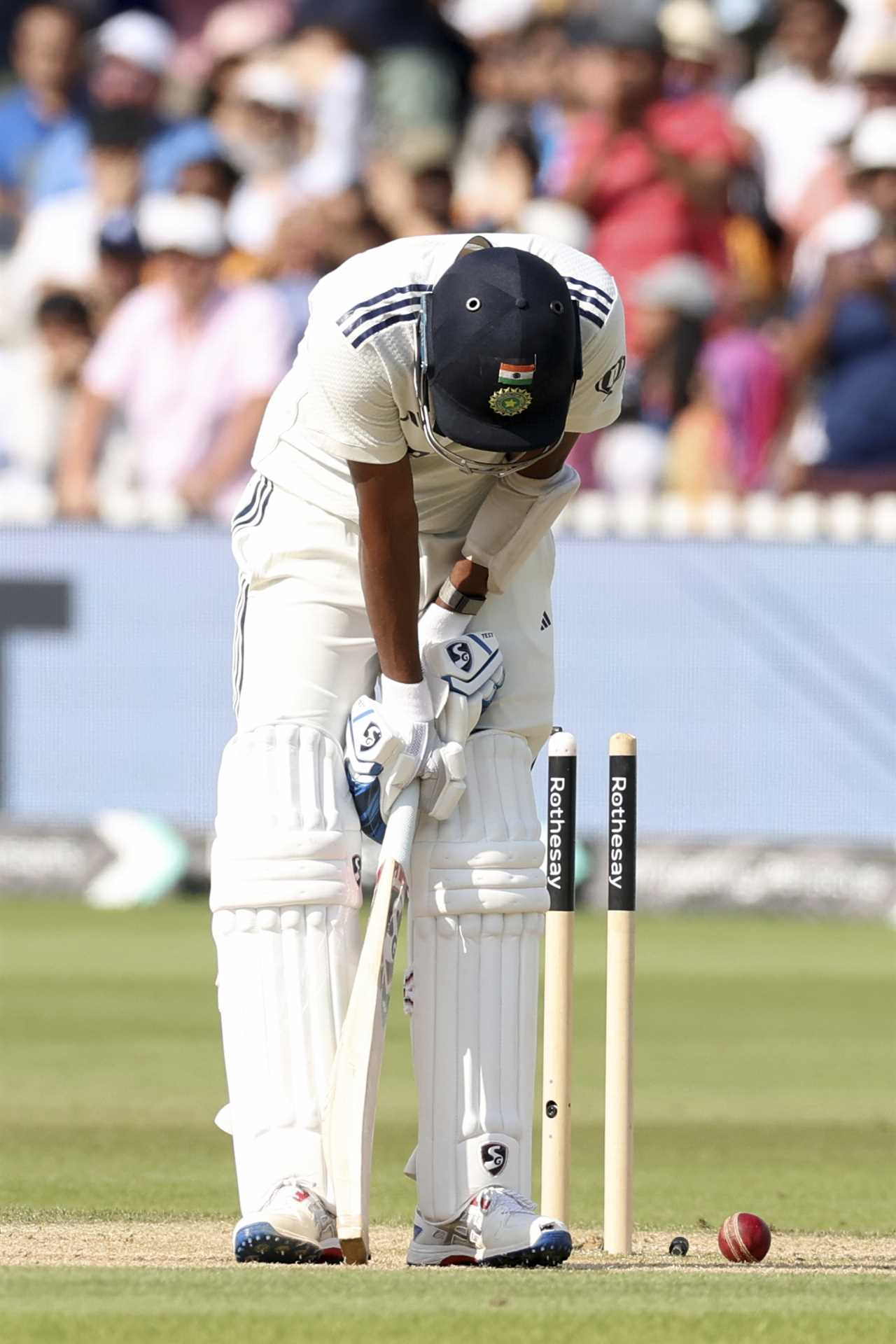 Mohammed Siraj reacts after being dismissed during a cricket match.