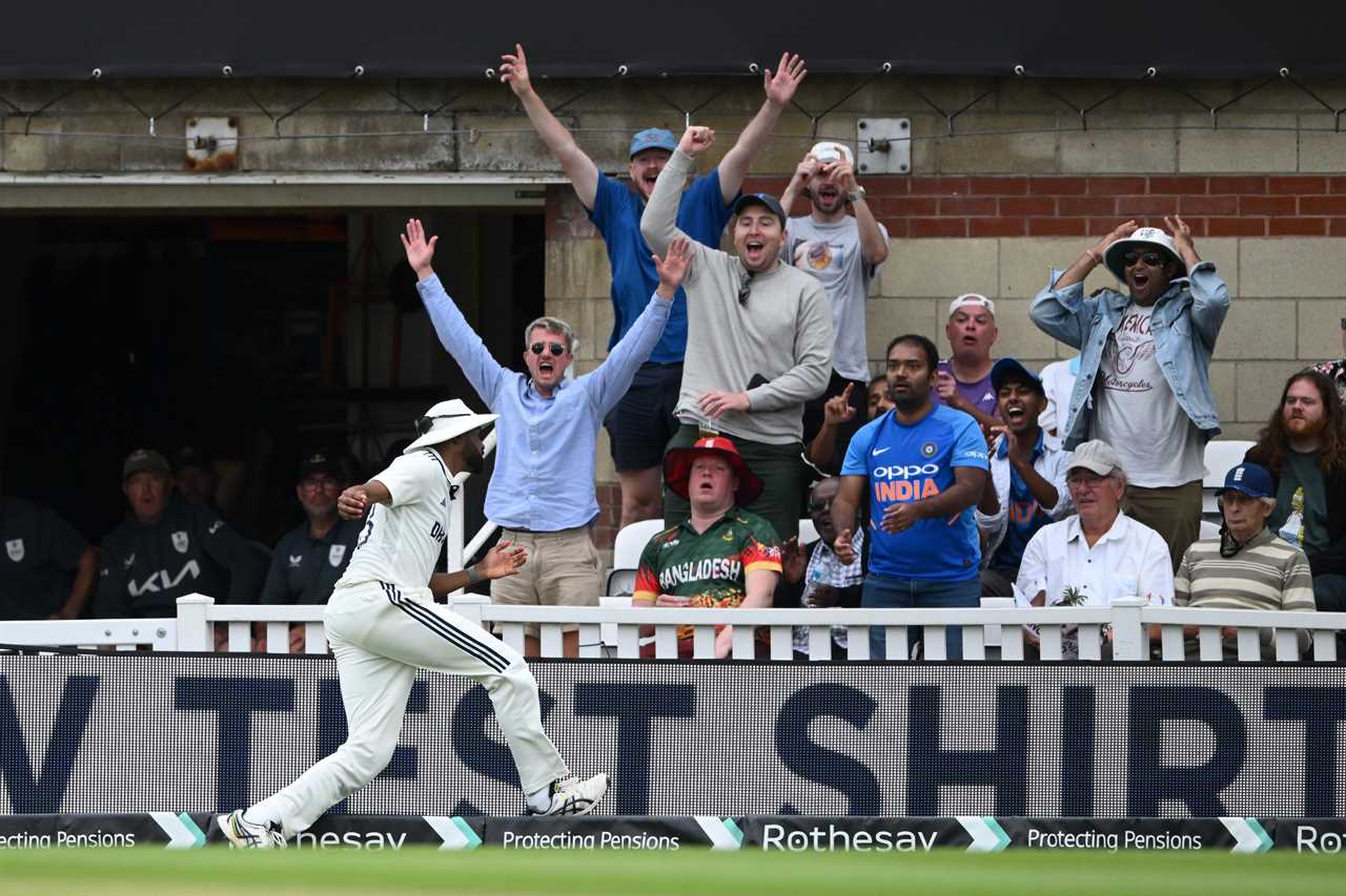 Mohammed Siraj of India running after catching a ball.