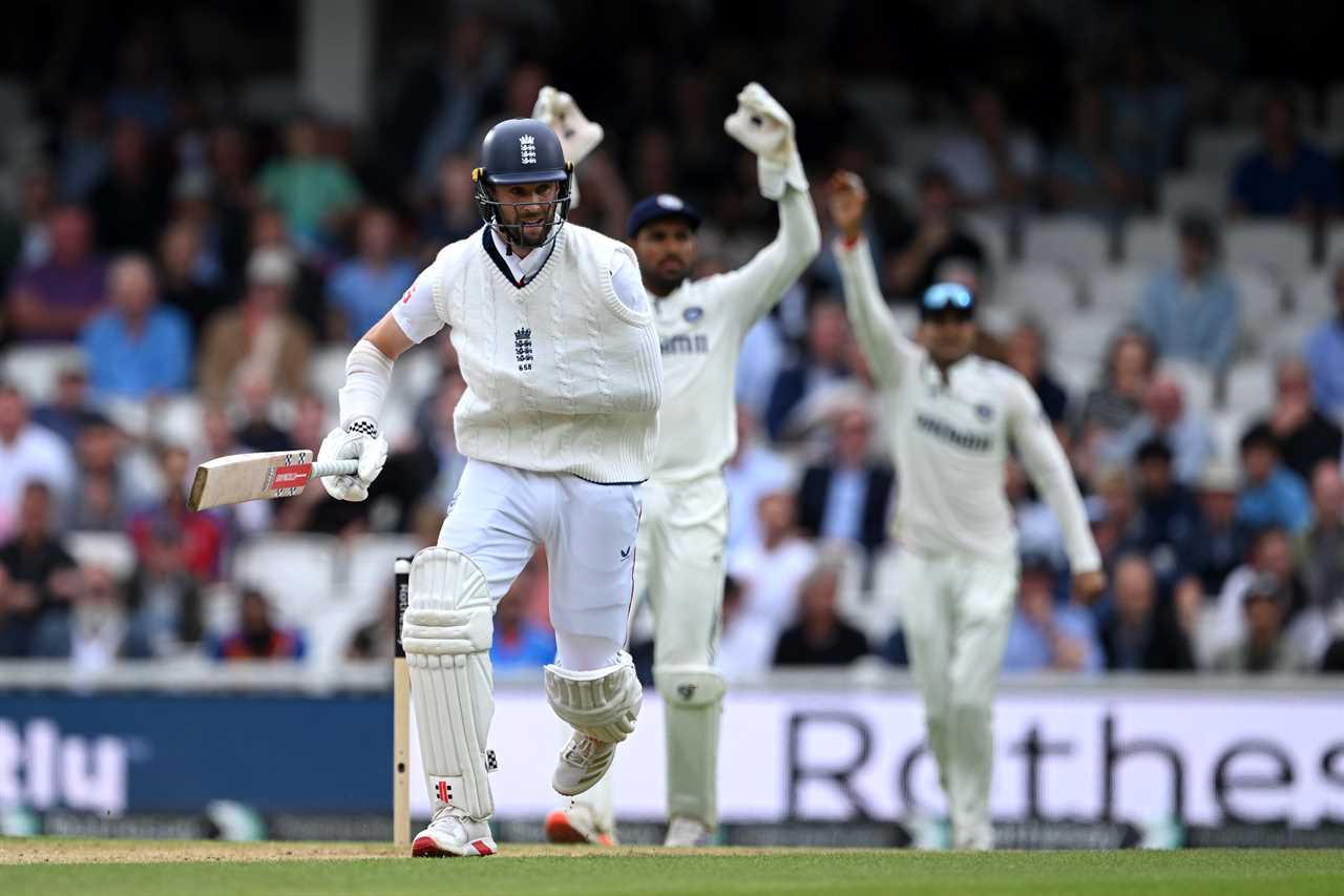 Chris Woakes of England running between wickets during a cricket match.