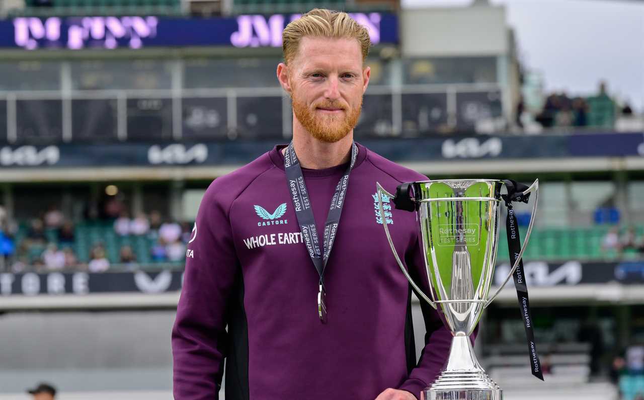 Ben Stokes holding a trophy.